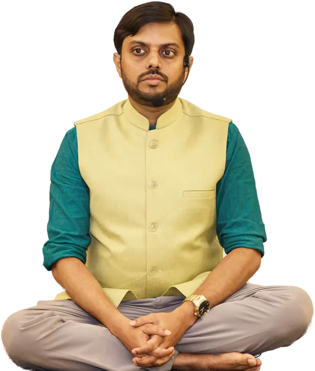 Dr. M. V. Priyaank in a seated meditation pose